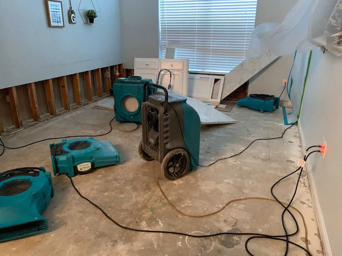 Dehumidifier in flood-cut room for Water Damage Restoration in Connersville